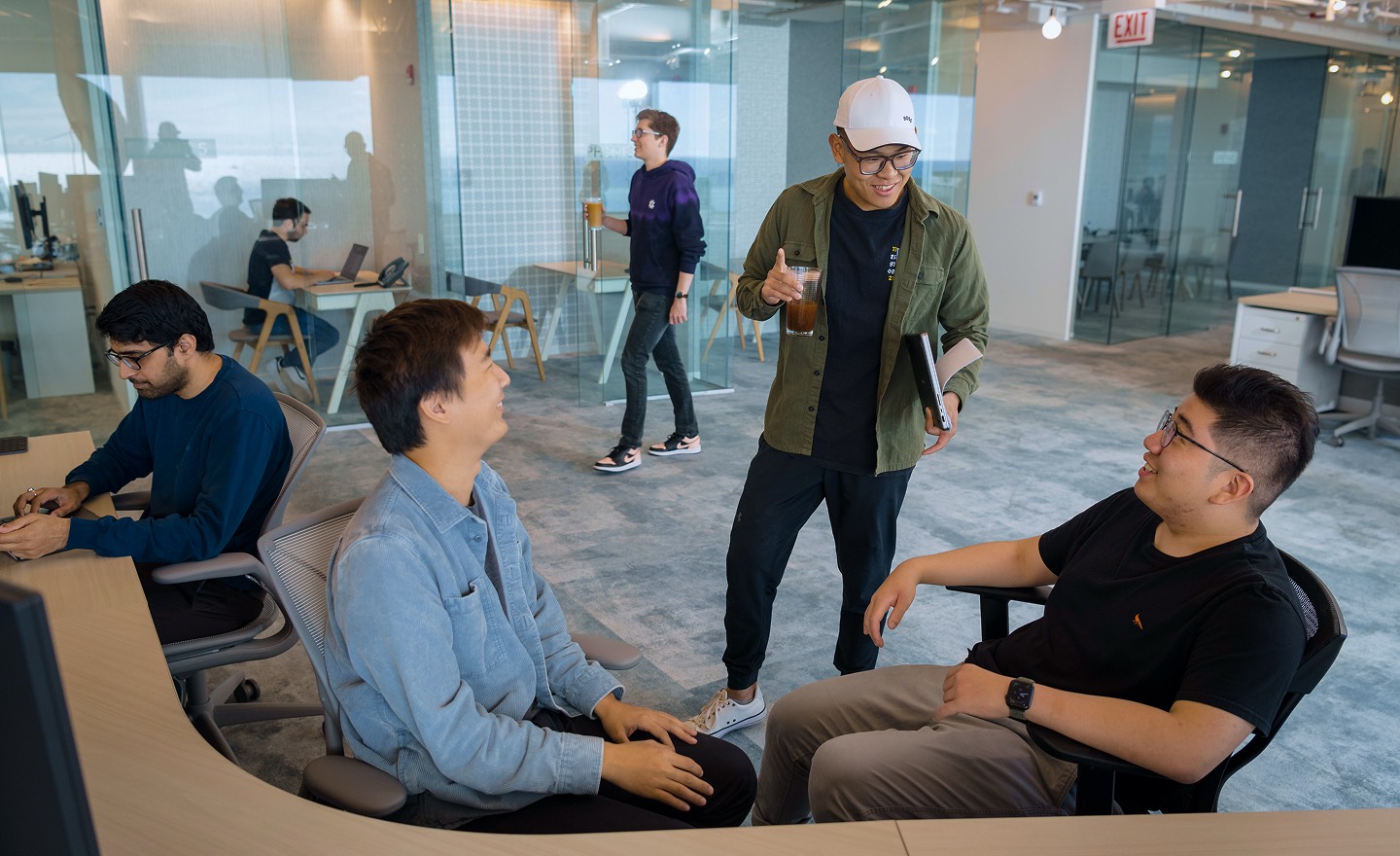 Akuna team enjoying workday conversation