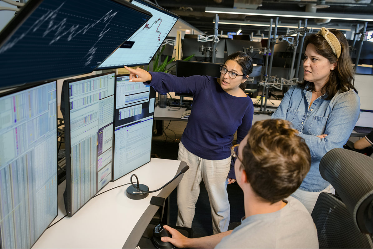 Trading team reviewing market data