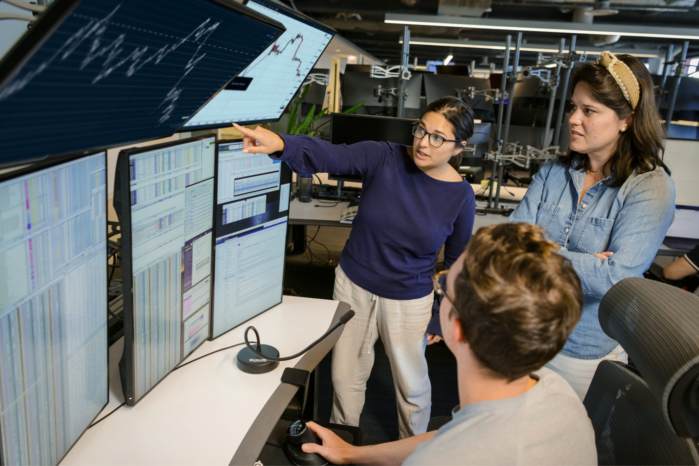 Trading team reviewing market data